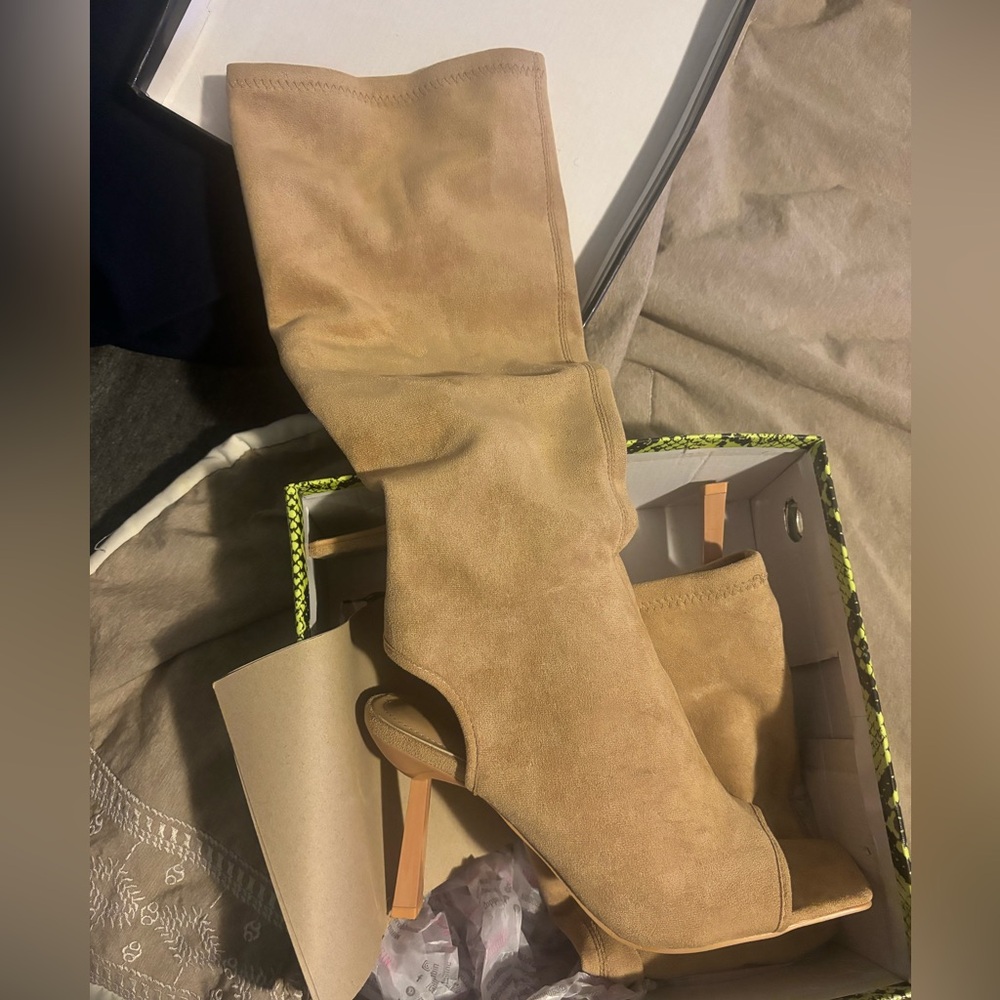 Women’s knee length peep toe heel